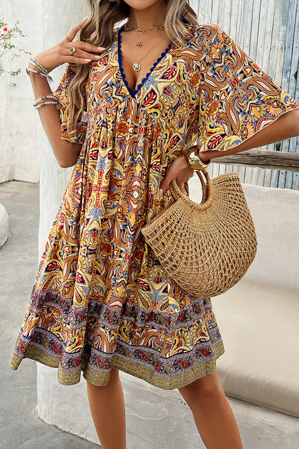 Devine Printed V-Neck Half Sleeve Mini Dress.