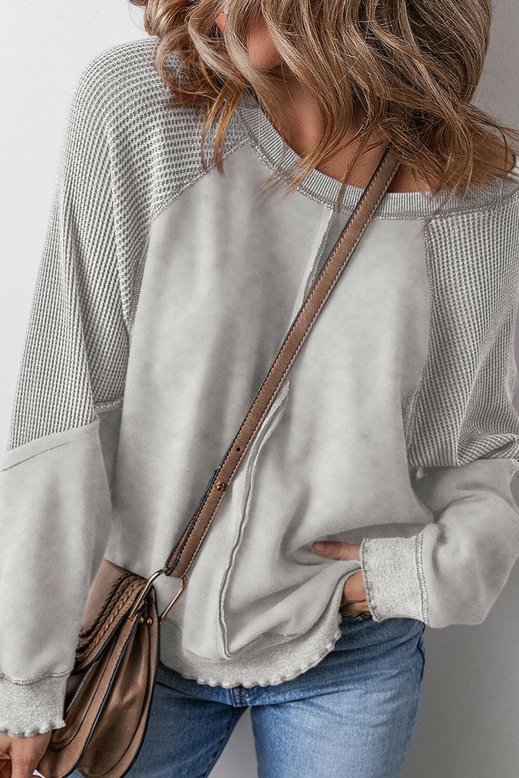 Exposed Seam Long Sleeve Sweatshirt.