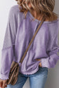 Exposed Seam Long Sleeve Sweatshirt.