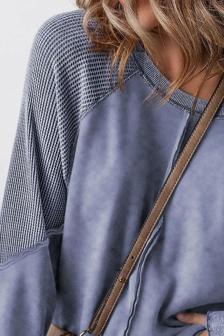 Exposed Seam Long Sleeve Sweatshirt.