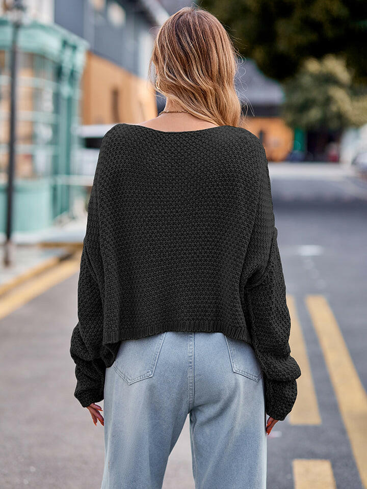 Round Neck Cable-Knit Sweater.