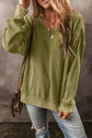 Round Neck Dropped Shoulder Sweatshirt.