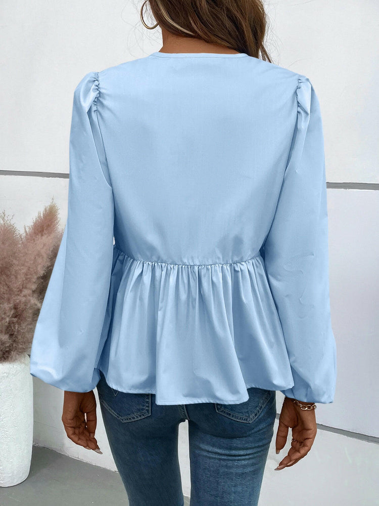 Ivy Lane Peplum Tied Long Sleeve Blouse.