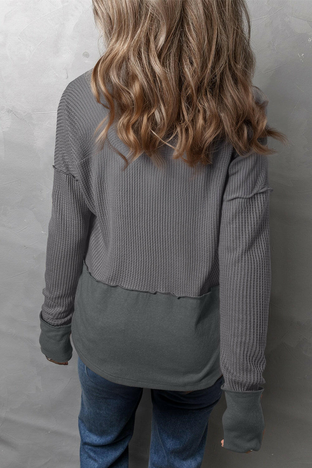 Waffle-Knit Exposed Seam Notched Long Sleeve Top.