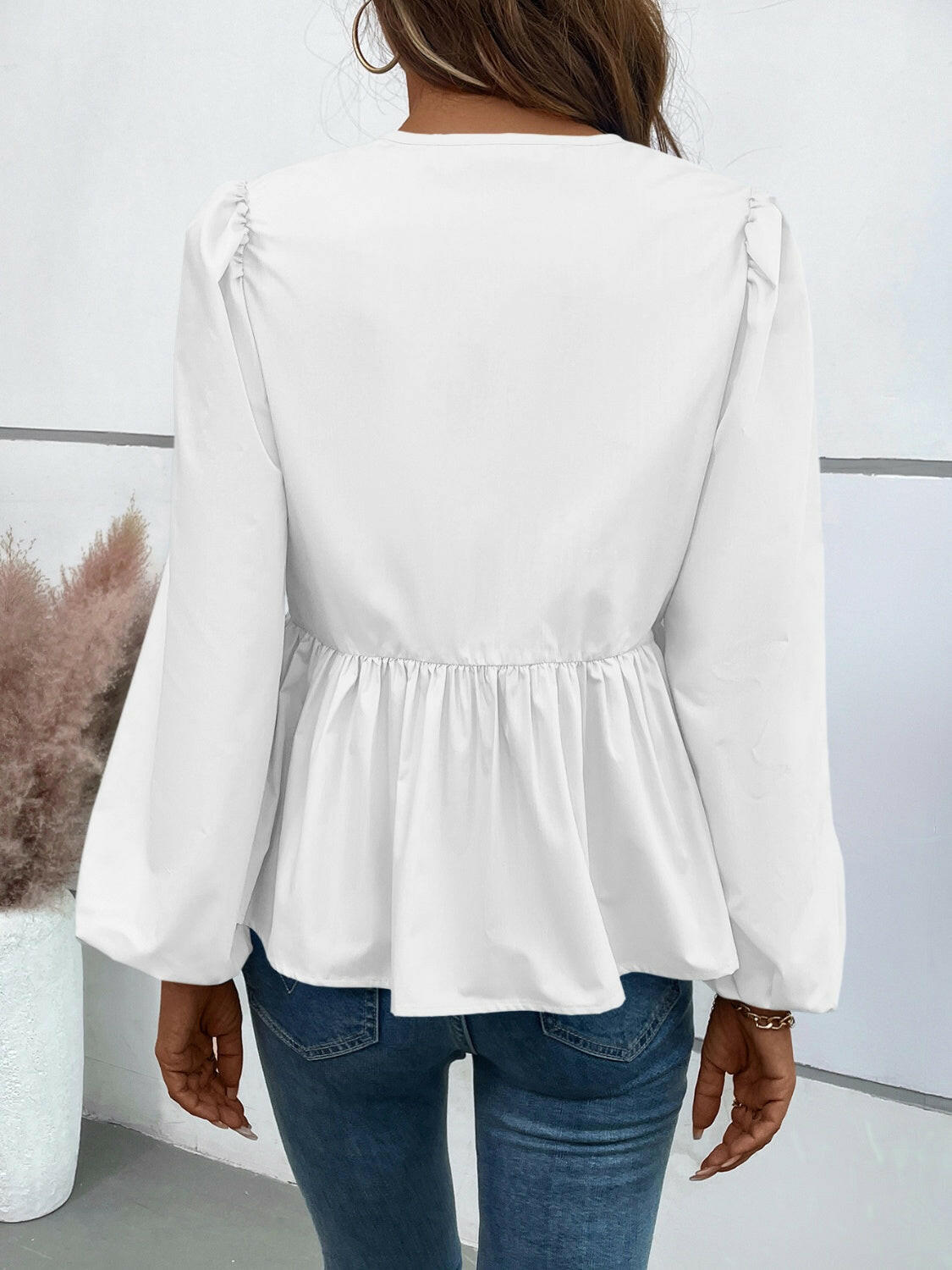 Ivy Lane Peplum Tied Long Sleeve Blouse.