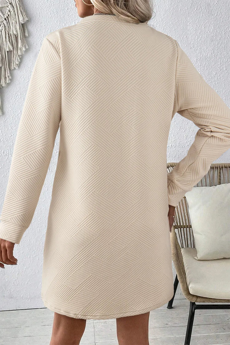 Textured Round Neck Long Sleeve Mini Dress.