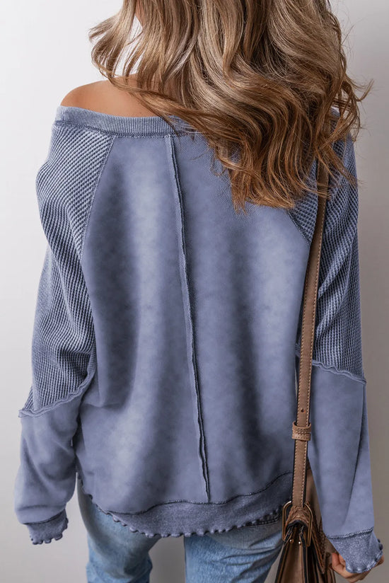 Exposed Seam Long Sleeve Sweatshirt.