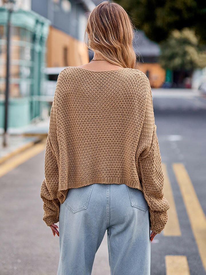 Round Neck Cable-Knit Sweater.