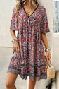 Devine Printed V-Neck Half Sleeve Mini Dress.