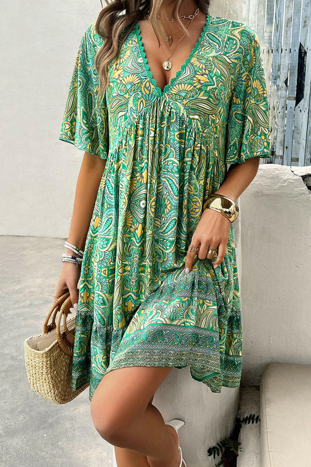 Devine Printed V-Neck Half Sleeve Mini Dress.