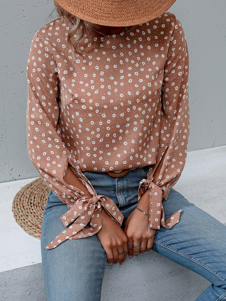 Honey Printed Round Neck Tie Cuff Blouse.