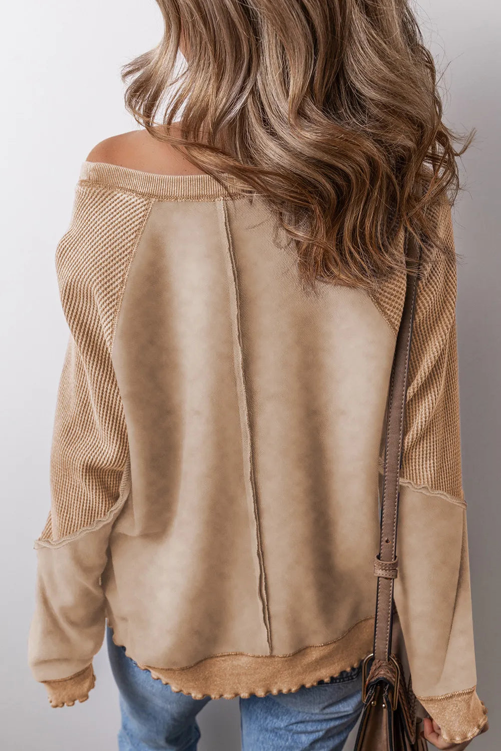 Exposed Seam Long Sleeve Sweatshirt.