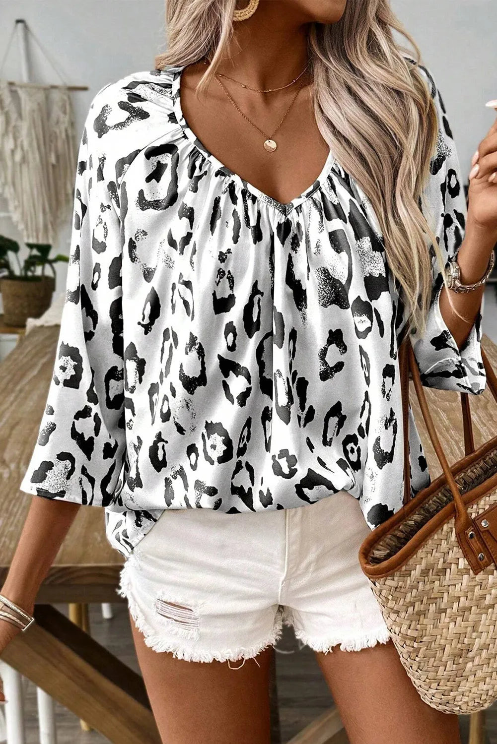 Leopard V-Neck Three-Quarter Sleeve Blouse.