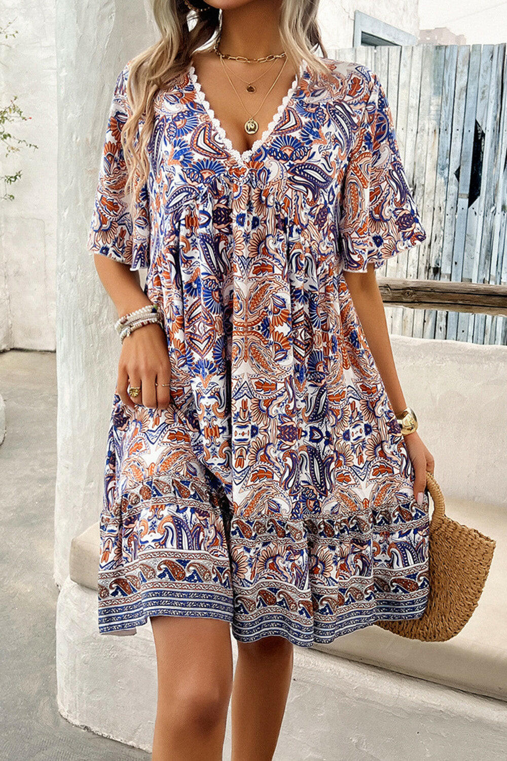 Devine Printed V-Neck Half Sleeve Mini Dress.