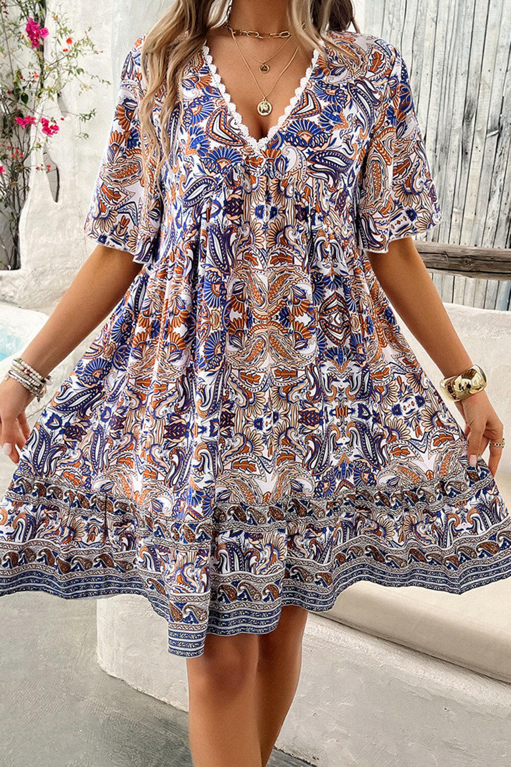 Devine Printed V-Neck Half Sleeve Mini Dress.