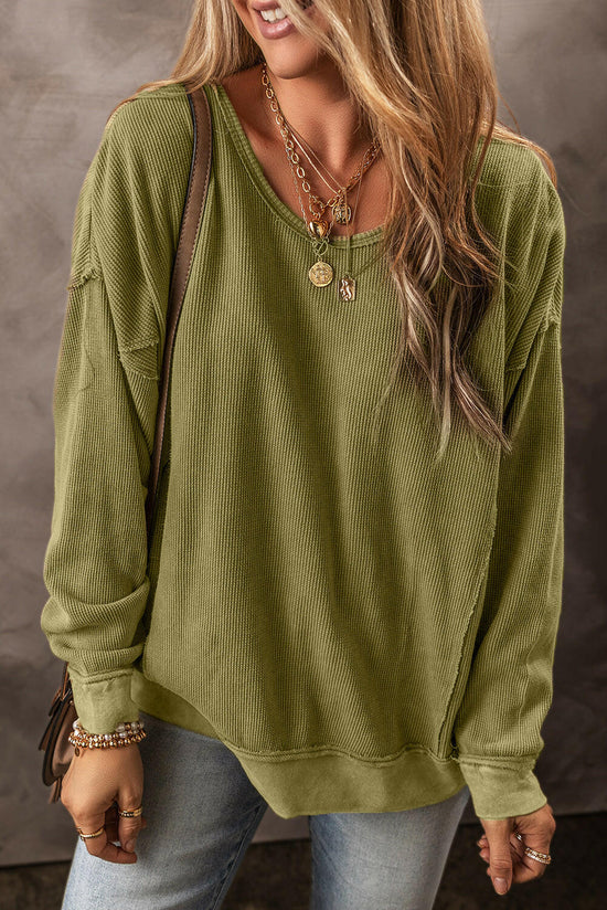 Round Neck Dropped Shoulder Sweatshirt.