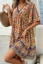 Devine Printed V-Neck Half Sleeve Mini Dress.