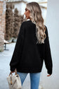 Devine Cable-Knit Round Neck Drop Shoulder Sweater.