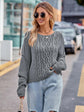 Round Neck Cable-Knit Sweater.