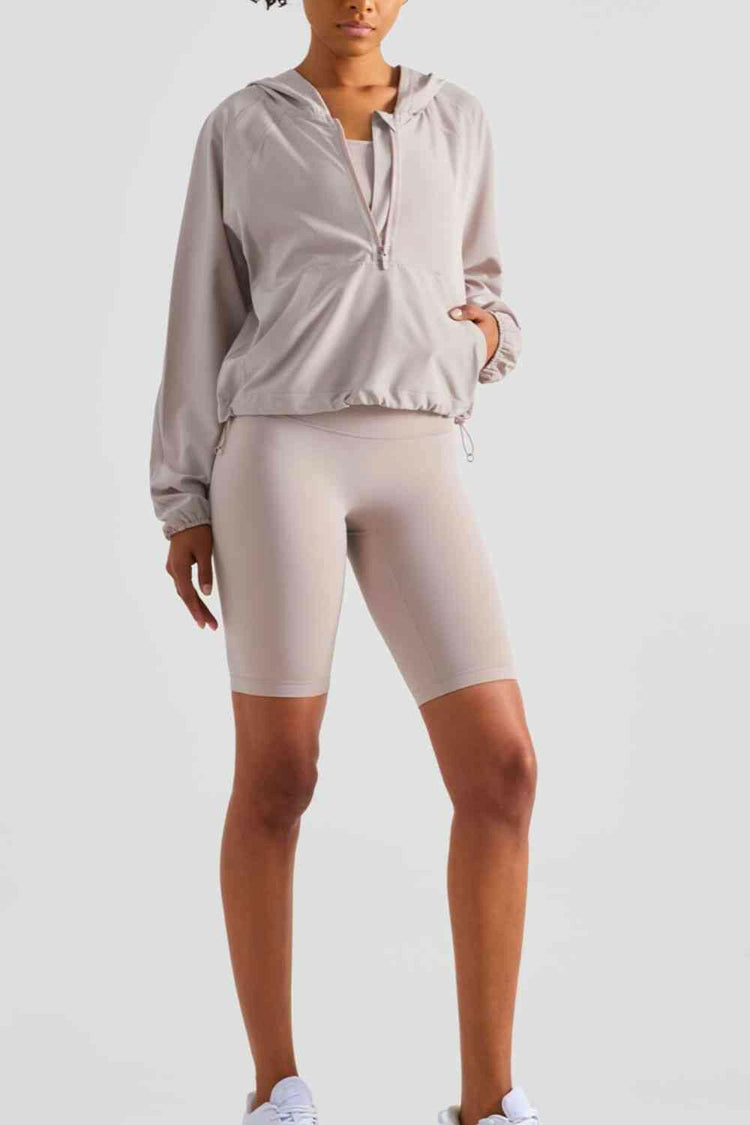 Half-Zip Hooded Sports Top.