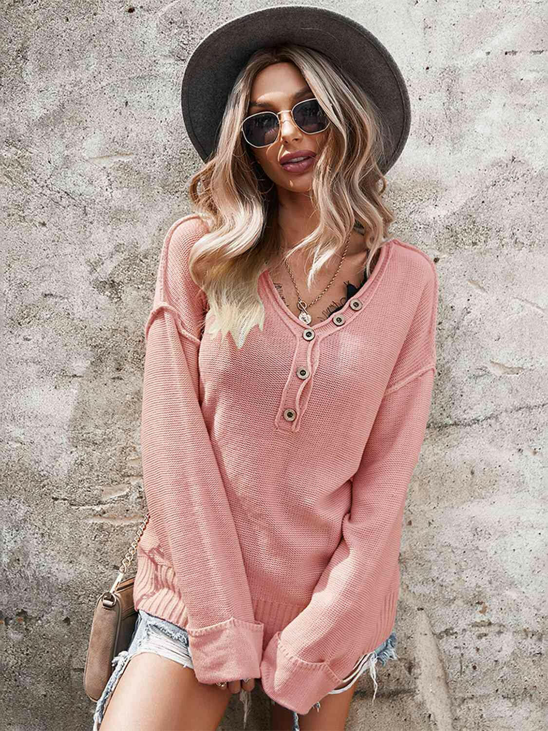 Buttoned Exposed Seam Knit Top.