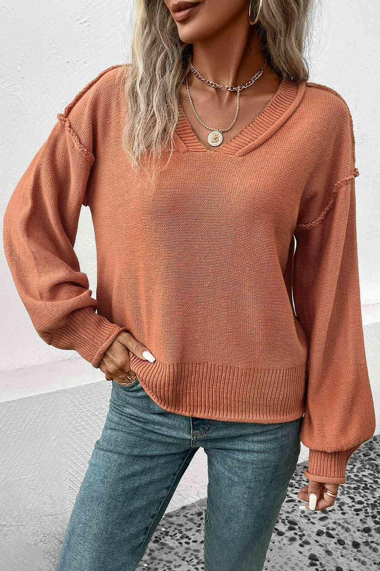 V-Neck Exposed Seam Sweater.