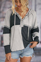 Exposed Seam Color Block Hoodie with Drawstring.