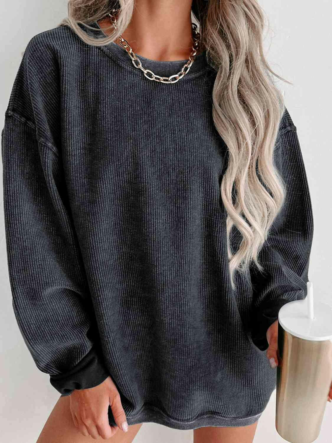 Round Neck Dropped Shoulder Sweatshirt.