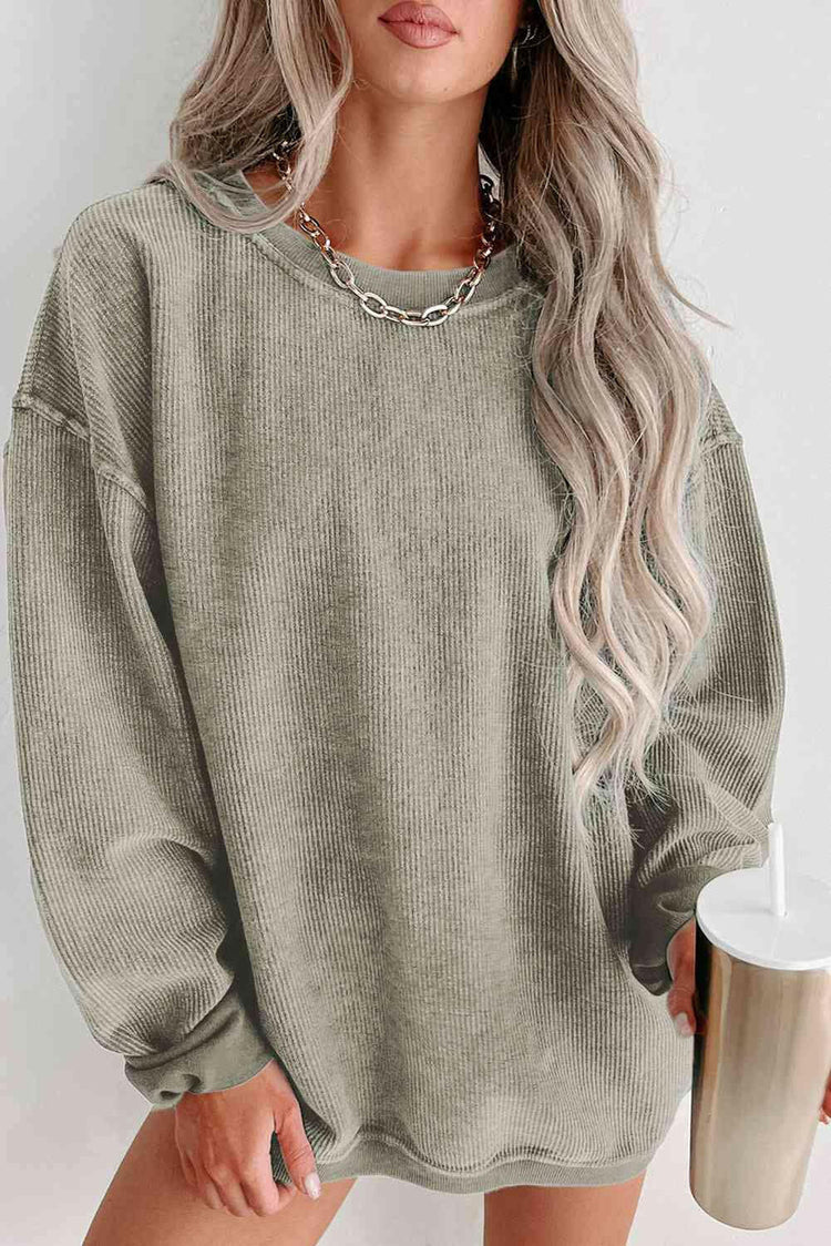 Round Neck Dropped Shoulder Sweatshirt.