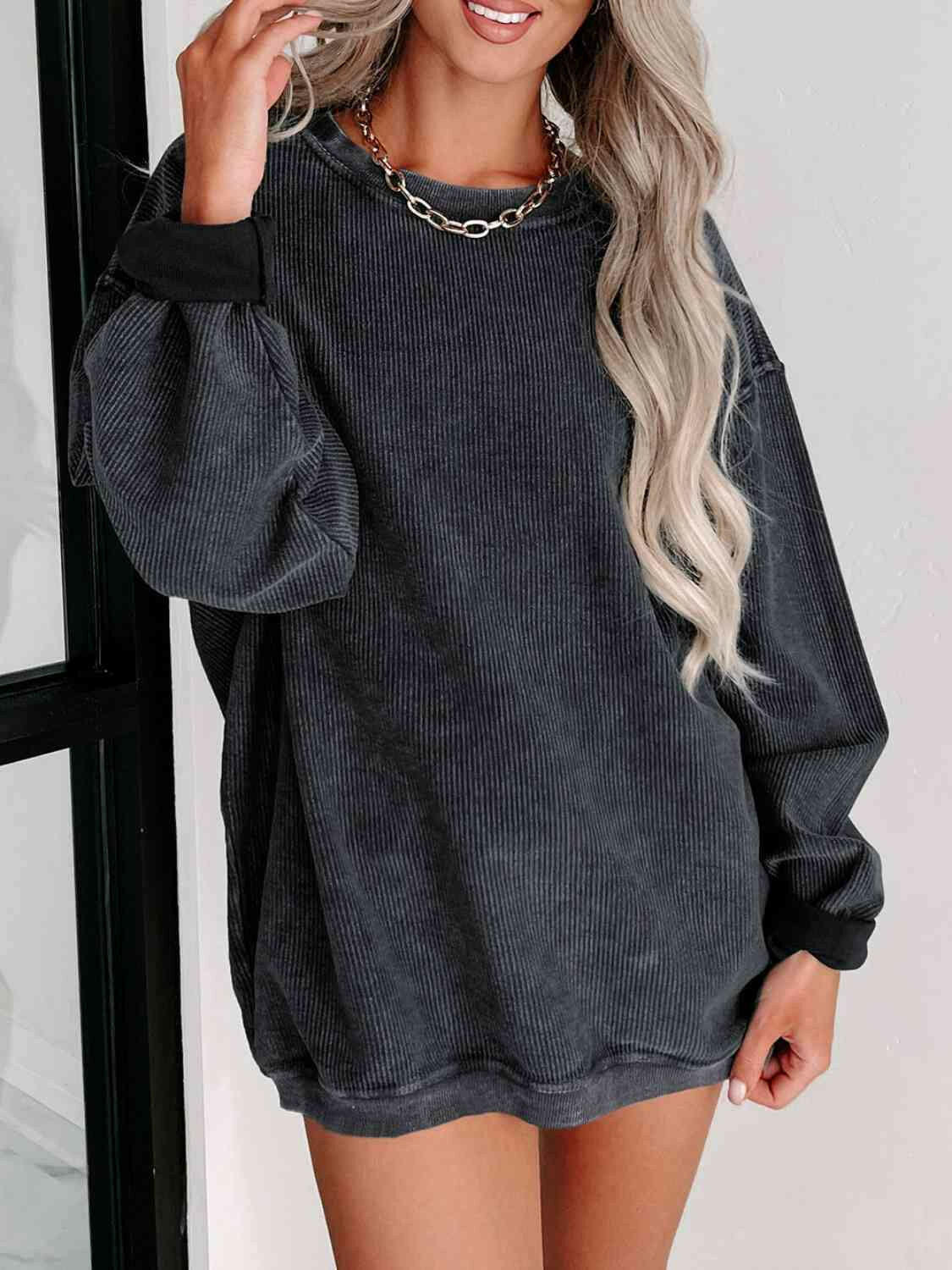 Round Neck Dropped Shoulder Sweatshirt.