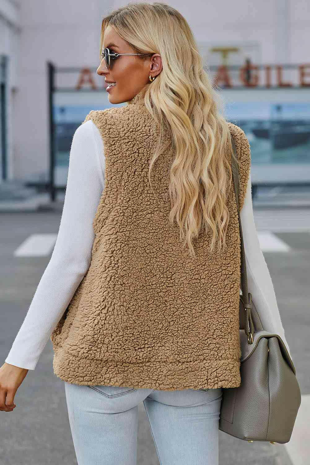 Snap Down Vest with Pockets.