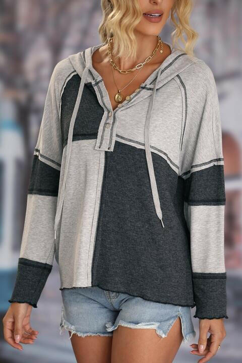 Exposed Seam Color Block Hoodie with Drawstring.