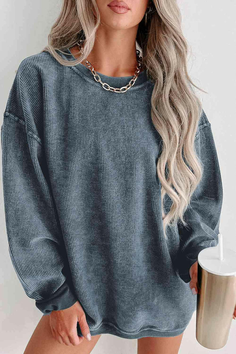 Round Neck Dropped Shoulder Sweatshirt.