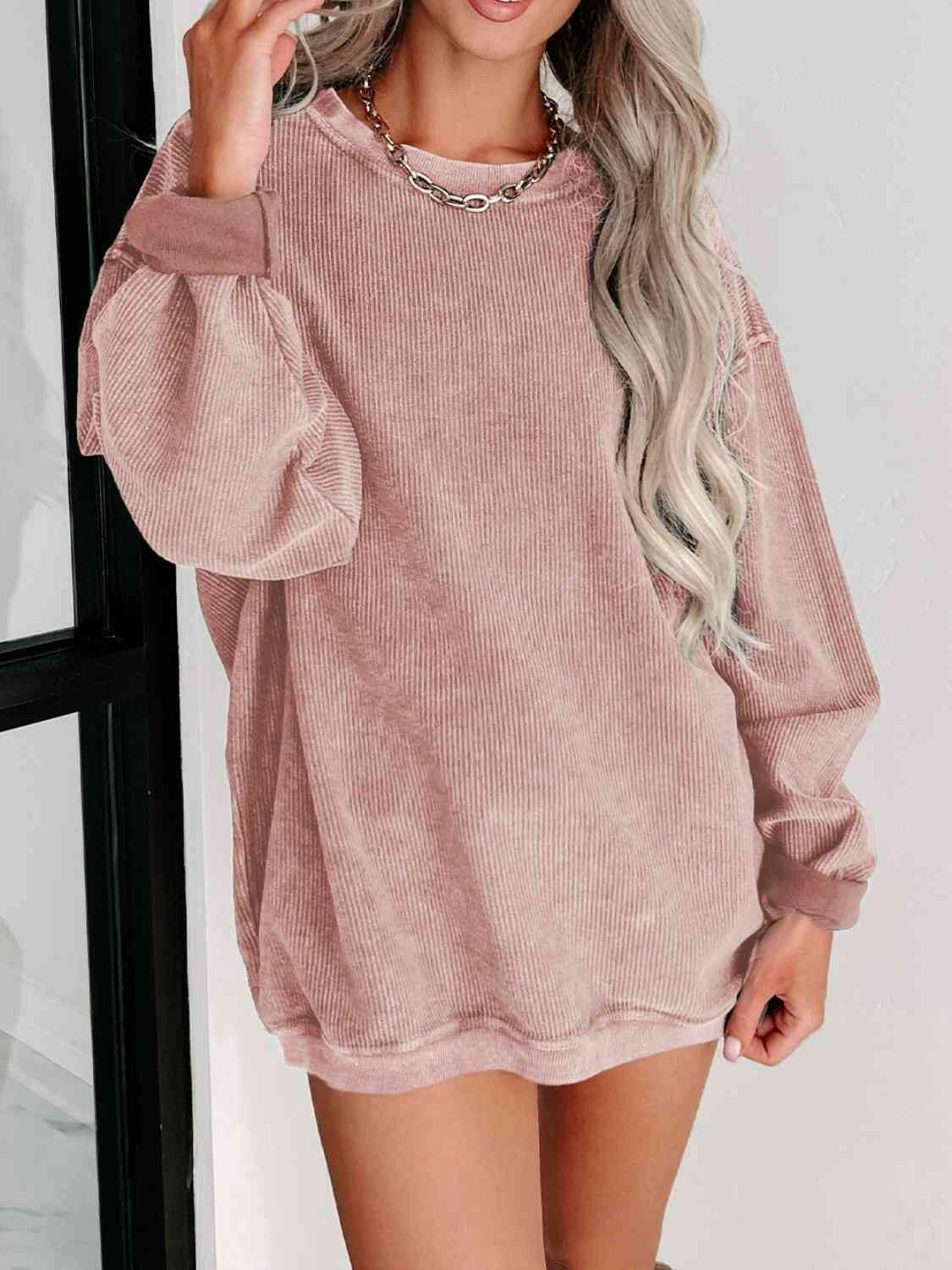 Round Neck Dropped Shoulder Sweatshirt.