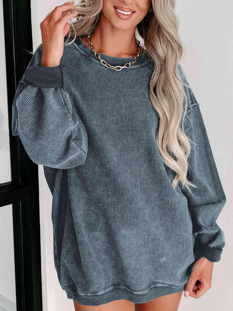 Round Neck Dropped Shoulder Sweatshirt.