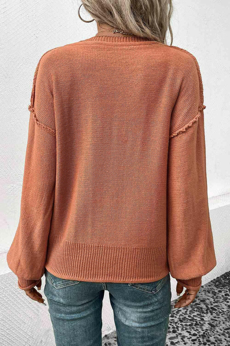 V-Neck Exposed Seam Sweater.